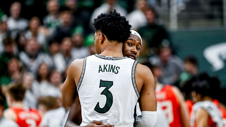 Michigan State's Tre Holloman, right, hugs Jaden Akins late during the second half in the game against Illinois on Sunday, Jan. 19, 2025, at the Breslin Center in East Lansing. Michigan State's Tre Holloman, right, hugs Jaden Akins late during the second half in the game against Illinois on Sunday, Jan. 19, 2025, at the Breslin Center in East Lansing.