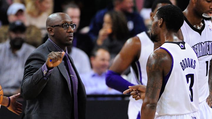 November 27, 2012; Sacramento, CA, USA; Sacramento Kings assistant coach Bobby Jackson (left) coaches point guard Aaron Brooks (3) during the first quarter against the Minnesota Timberwolves at Sleep Train Arena. The Timberwolves defeated the Kings 97-89. Mandatory Credit: Kyle Terada-Imagn Images
