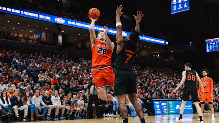 Virginia Cavaliers forward Thijs De Ridder and Miami Hurricanes forward Shelton Henderson 