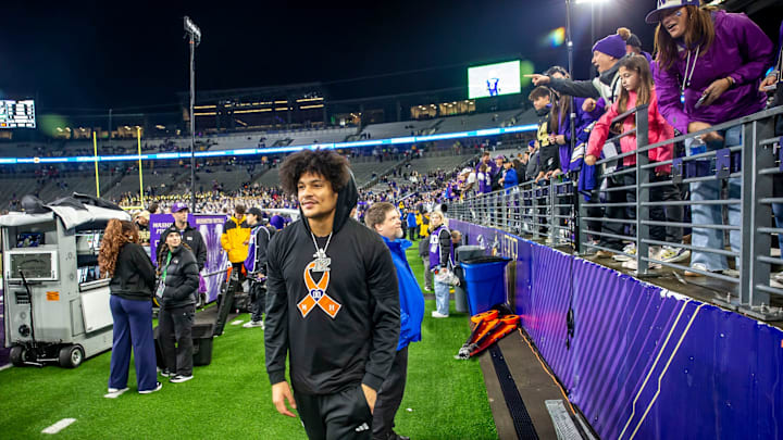 Denzel Boston is shown in street clothes for the UW-Purdue game. 