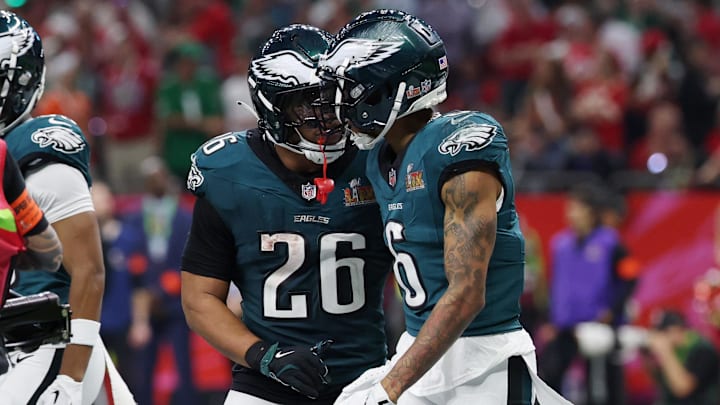 Feb 9, 2025; New Orleans, LA, USA; Philadelphia Eagles wide receiver DeVonta Smith (6) celebrates with running back Saquon Barkley (26) after scoring a touchdown against the Kansas City Chiefs during the second half of Super Bowl LIX at Caesars Superdome. Mandatory Credit: Geoff Burke-Imagn Images