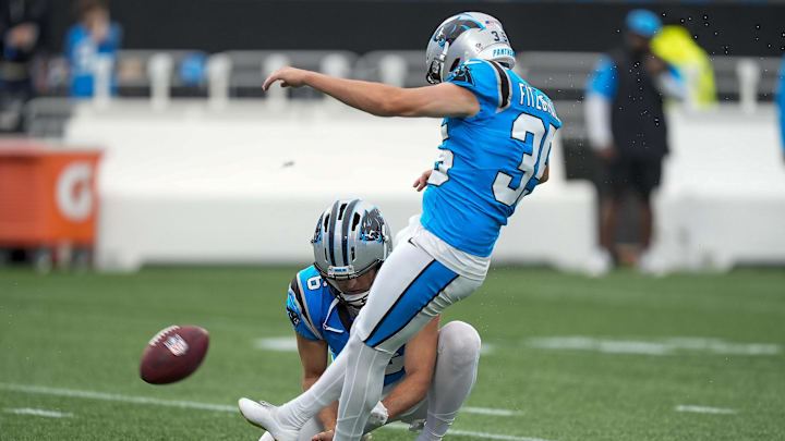 Carolina Panthers place kicker Ryan Fitzgerald kicks during Fanfest at Bank of America Stadium.