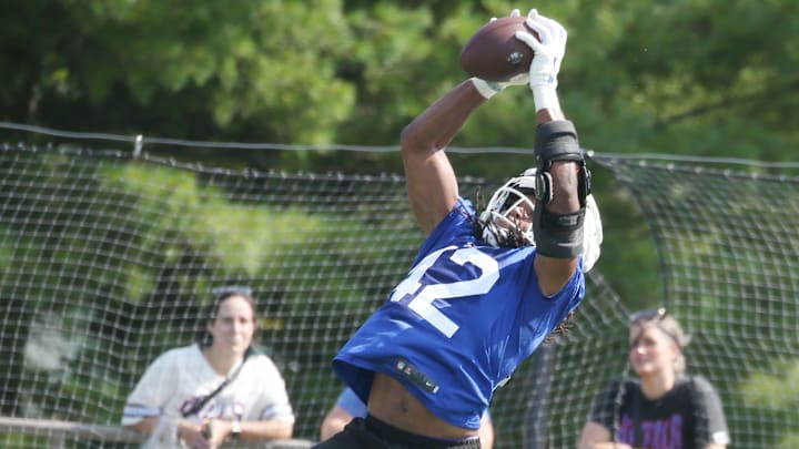 Bills linebacker Dorian Williams goes up for the ball during interception drills during the second day of Buffalo Bills training camp at St. John Fisher University Thursday, July 24, 2025 in Pittsford.