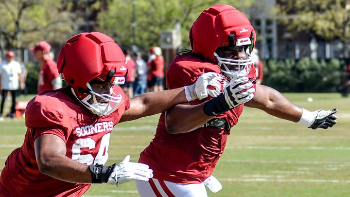 Oklahoma offensive linemen Eddy Pierre-Louis and Sean Hutton (64) at practice. Oklahoma offensive linemen Eddy Pierre-Louis and Sean Hutton (64) at practice.