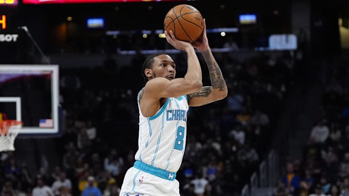 Feb 20, 2025; Denver, Colorado, USA; Charlotte Hornets guard Nick Smith Jr. (8) shoots the ball in the first quarter against the Denver Nuggets at Ball Arena. Mandatory Credit: Ron Chenoy-Imagn Images Feb 20, 2025; Denver, Colorado, USA; Charlotte Hornets guard Nick Smith Jr. (8) shoots the ball in the first quarter against the Denver Nuggets at Ball Arena. Mandatory Credit: Ron Chenoy-Imagn Images