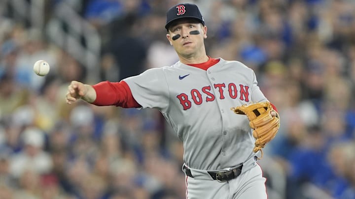Sep 25, 2025; Toronto, Ontario, CAN; Boston Red Sox third baseman Alex Bregman (2) throws out Toronto Blue Jays catcher Tyler Heineman (not pictured) at first base during the third inning at Rogers Centre. Mandatory Credit: John E. Sokolowski-Imagn Images