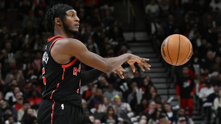 Apr 4, 2025; Toronto, Ontario, CAN;  Toronto Raptors guard Immanuel Quickley (5) passes the ball against the Detroit Pistons in the second half at Scotiabank Arena. Mandatory Credit: Dan Hamilton-Imagn Images