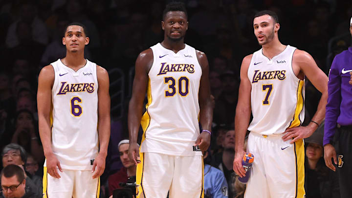 Jan 21, 2018; Los Angeles, CA, USA;  Los Angeles Lakers guard Jordan Clarkson (6), forward Julius Randle (30) and forward Larry Nance Jr. (7) look on from the bench in the fourth quarter of the game at Staples Center. Mandatory Credit: Jayne Kamin-Oncea-Imagn Images