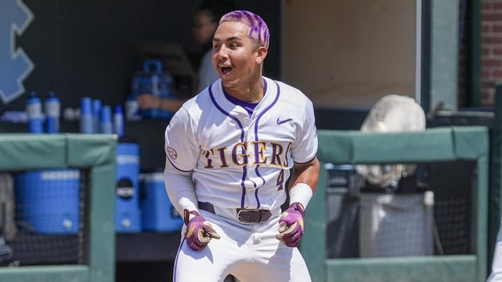 May 31, 2024; Chapel Hill, NC, USA; LSU infielder Steven Milam (4) celebrates his winning home run against the Wofford Terriers during the NCAA Regional in Chapel Hill. Mandatory Credit: Jim Dedmon-USA TODAY Sports