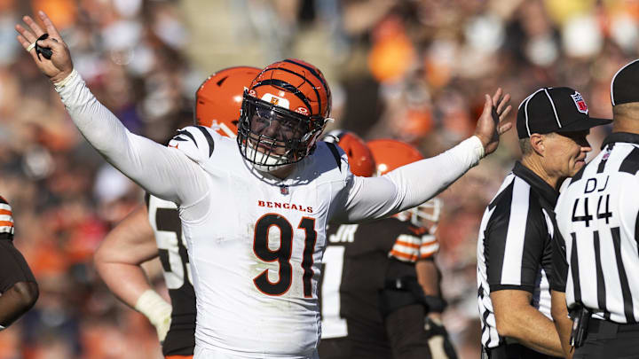 Oct 20, 2024; Cleveland, Ohio, USA; Cincinnati Bengals defensive end Trey Hendrickson (91) reacts following penalty flags being thrown during the fourth quarter against the Cleveland Browns at Huntington Bank Field. The penalties were against the Browns. Mandatory Credit: Scott Galvin-Imagn Images