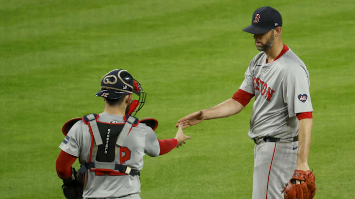 Aug 30, 2024; Detroit, Michigan, USA;  Boston Red Sox pitcher Chris Martin (55) and catcher Connor Wong (12) celebrate after defeating  the Detroit Tigers at Comerica Park. Mandatory Credit: Rick Osentoski-Imagn Images