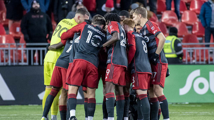Toronto FC players huddle before the MLS game between...