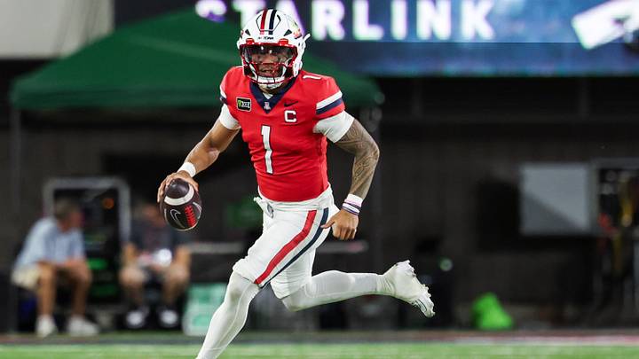 Sep 19, 2026; Tucson, Arizona, USA; Arizona Wildcats quarterback Noah Fifita (1) runs with the ball during the fourth quarter of the game against the Northern Illinois Huskies at Casino Del Sol Stadium. Sep 19, 2026; Tucson, Arizona, USA; Arizona Wildcats quarterback Noah Fifita (1) runs with the ball during the fourth quarter of the game against the Northern Illinois Huskies at Casino Del Sol Stadium.