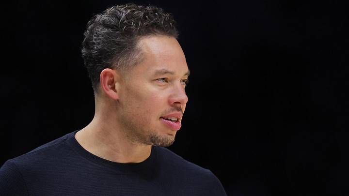 May 10, 2026; Minneapolis, Minnesota, USA; San Antonio Spurs head coach Mitch Johnson watches as his team plays the Minnesota Timberwolves in the third quarter of game four of the second round of the 2026 NBA Playoffs at Target Center. Mandatory Credit: Bruce Kluckhohn-Imagn Images