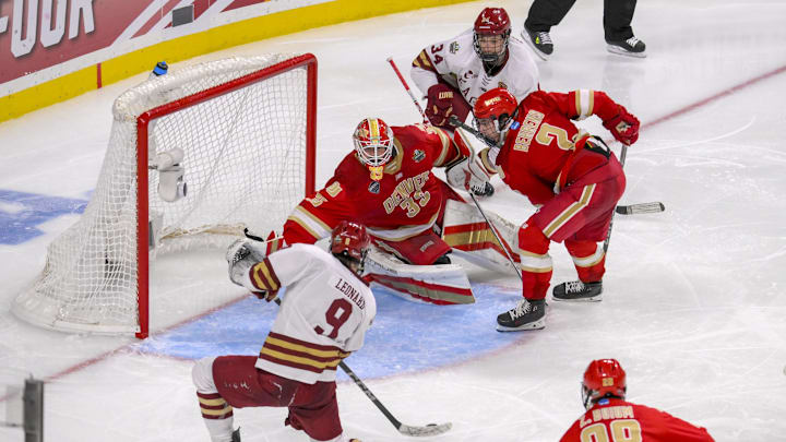 Apr 13, 2024; Saint Paul, Minnesota, USA; Boston College Eagles forward Ryan Leonard (9) takes a shot on Denver Pioneers goalie Matt Davis (35) during the third period of the championship game of the 2024 Frozen Four college ice hockey tournament at Xcel Energy Center. Mandatory Credit: Nick Wosika-Imagn Images
