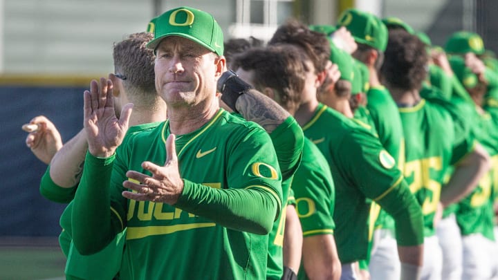 Oregon baseball coach Mark Wasikowski joins his team before their home opener against the Lafayette Leopards at PK Park in Eugene Friday, Feb. 23, 2024. Oregon baseball coach Mark Wasikowski joins his team before their home opener against the Lafayette Leopards at PK Park in Eugene Friday, Feb. 23, 2024.