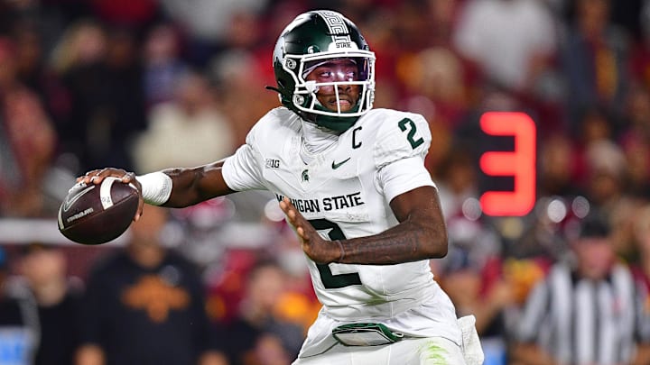 Sep 20, 2025; Los Angeles, California, USA; Michigan State Spartans quarterback Aidan Chiles (2) throws against the Southern California Trojans during the second half at the Los Angeles Memorial Coliseum. Mandatory Credit: Gary A. Vasquez-Imagn Images