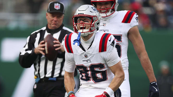 Dec 28, 2025; East Rutherford, New Jersey, USA; New England Patriots wide receiver Efton Chism III (86) celebrates after a catch against the New York Jets during the first quarter of the game at MetLife Stadium. Mandatory Credit: Vincent Carchietta-Imagn Images