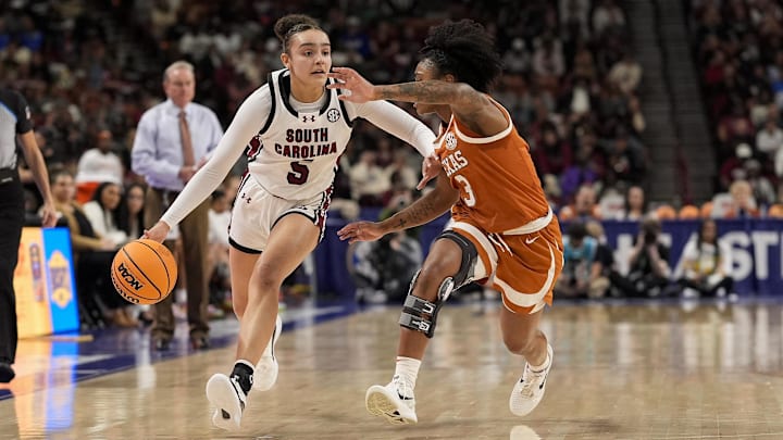 Mar 9, 2025; Greenville, SC, USA; South Carolina Gamecocks guard Tessa Johnson (5) brings the ball up court against Texas Longhorns guard Rori Harmon (3) during the second half at Bon Secours Wellness Arena. Mandatory Credit: Jim Dedmon-Imagn Images Mar 9, 2025; Greenville, SC, USA; South Carolina Gamecocks guard Tessa Johnson (5) brings the ball up court against Texas Longhorns guard Rori Harmon (3) during the second half at Bon Secours Wellness Arena. Mandatory Credit: Jim Dedmon-Imagn Images