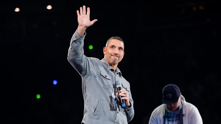 Penn State Nittany Lions football head coach Matt Campbell waves to the crowd during a Big Ten wrestling match vs. Nebraska.