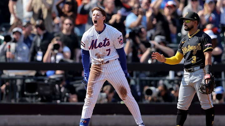 Mar 26, 2026; New York City, New York, USA; New York Mets designated hitter Brett Baty (7) reacts after hitting an RBI triple against the Pittsburgh Pirates during the first inning at Citi Field. Mandatory Credit: Brad Penner-Imagn Images