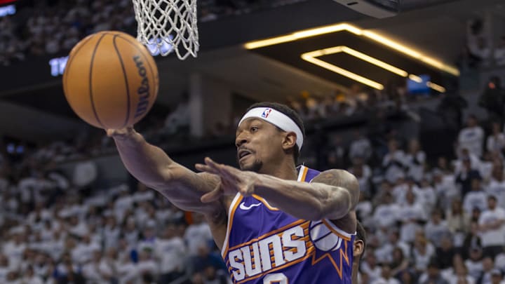 Apr 20, 2024; Minneapolis, Minnesota, USA; Phoenix Suns guard Bradley Beal (3) drives to the basket and passes the ball against the Minnesota Timberwolves in the first half during game one of the first round for the 2024 NBA playoffs at Target Center. Mandatory Credit: Jesse Johnson-Imagn Images