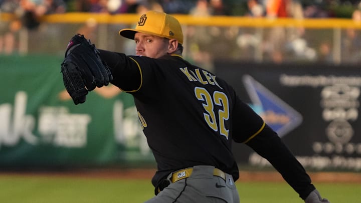 Mar 18, 2025; Scottsdale, Arizona, USA; San Diego Padres pitcher Stephen Kolek (32) throws against the San Francisco Giants in the first inning at Scottsdale Stadium. Mandatory Credit: Rick Scuteri-Imagn Images