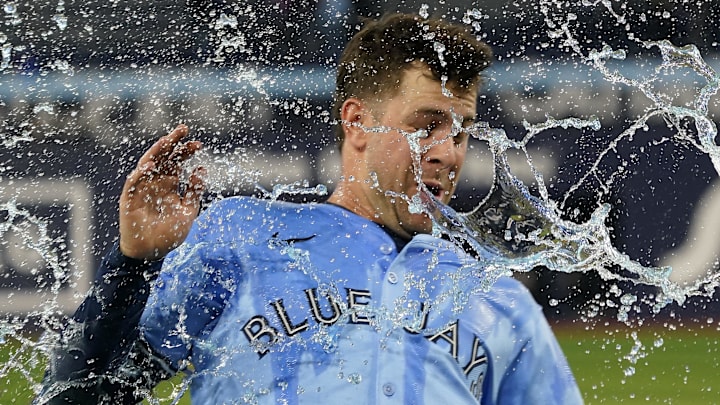 May 29, 2025; Toronto, Ontario, CAN; Toronto Blue Jays third baseman Ernie Clement (22) gets doused with water after win over the Athletics at Rogers Centre. Mandatory Credit: John E. Sokolowski-Imagn Images May 29, 2025; Toronto, Ontario, CAN; Toronto Blue Jays third baseman Ernie Clement (22) gets doused with water after win over the Athletics at Rogers Centre. Mandatory Credit: John E. Sokolowski-Imagn Images