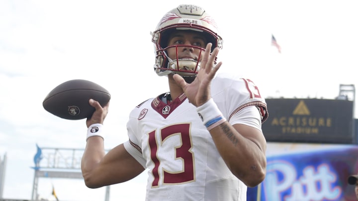 Nov 4, 2023; Pittsburgh, Pennsylvania, USA; Florida State Seminoles quarterback Jordan Travis (13) warms up before the game against the Pittsburgh Panthers at Acrisure Stadium. Mandatory Credit: Charles LeClaire-Imagn Images Nov 4, 2023; Pittsburgh, Pennsylvania, USA; Florida State Seminoles quarterback Jordan Travis (13) warms up before the game against the Pittsburgh Panthers at Acrisure Stadium. Mandatory Credit: Charles LeClaire-Imagn Images