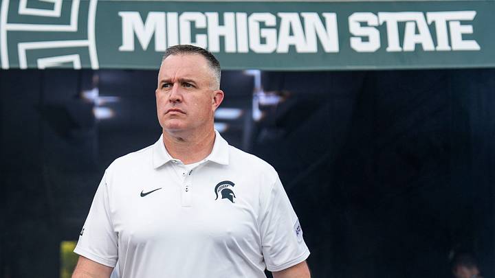 Michigan State head coach Pat Fitzgerald walks onto the field for practice ahead of the Toledo game at Spartan Stadium in East Lansing on Friday, Sept. 4, 2026. Michigan State head coach Pat Fitzgerald walks onto the field for practice ahead of the Toledo game at Spartan Stadium in East Lansing on Friday, Sept. 4, 2026.