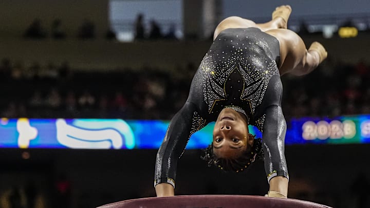 Mar 18, 2023; Duluth, GA, USA; Missouri Tigers gymnast Jocelyn Moore launches off the vault during the SEC Gymnastics Championship at Gas South Arena. Mandatory Credit: Dale Zanine-Imagn Images