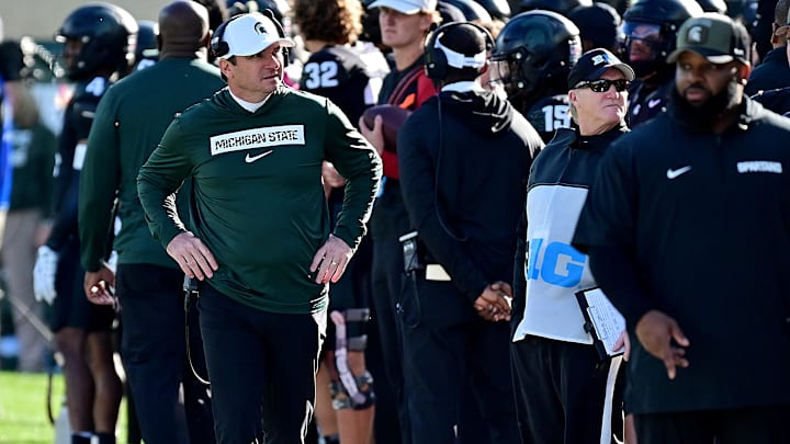 Nov 2, 2024; East Lansing, Michigan, USA;  Michigan State Spartans head coach Jonathan Smith looks over his sidelines during the first quarter against the Indiana Hoosiers at Spartan Stadium. Mandatory Credit: Dale Young-Imagn Images