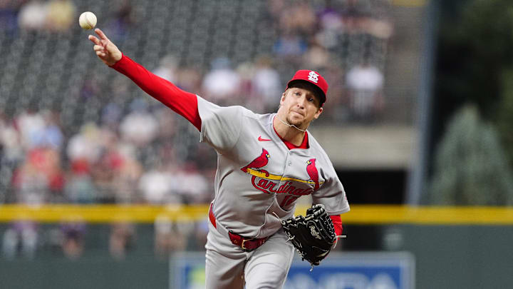 Denver, Colorado, USA; St. Louis Cardinals starting pitcher Erick Fedde (12) delivers a pitch in the first inning against the Colorado Rockies at Coors Field