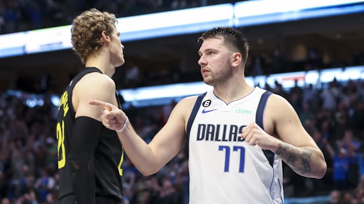Nov 2, 2022; Dallas, Texas, USA;  Dallas Mavericks guard Luka Doncic (77) reacts in front of Utah Jazz forward Lauri Markkanen (23) after the game at American Airlines Center. Mandatory Credit: Kevin Jairaj-Imagn Images