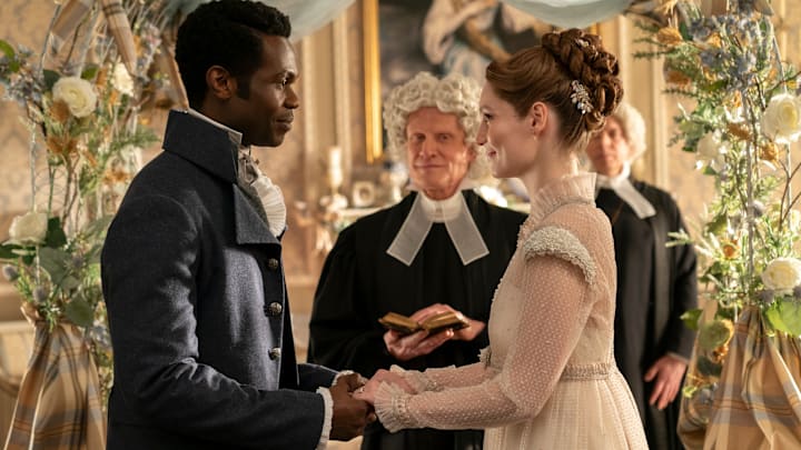 Bridgerton. (L to R) Victor Alli as John Stirling, James Duke as Minister Hughes, Hannah Dodd as Francesca Bridgerton in episode 308 of Bridgerton. Cr. Liam Daniel/Netflix © 2024