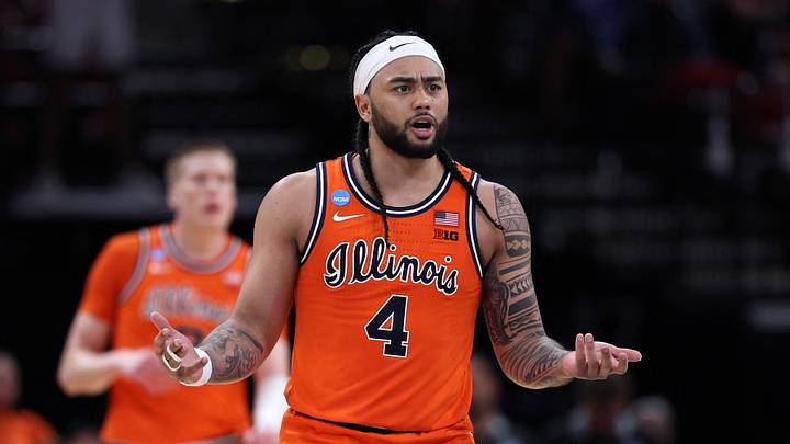 Mar 26, 2026; Houston, TX, USA; Illinois Fighting Illini guard Kylan Boswell (4) reacts against the Houston Cougars in the first half during a Sweet Sixteen game of the South Regional of the men's 2026 NCAA Tournament at Toyota Center. Mandatory Credit: Troy Taormina-Imagn Images