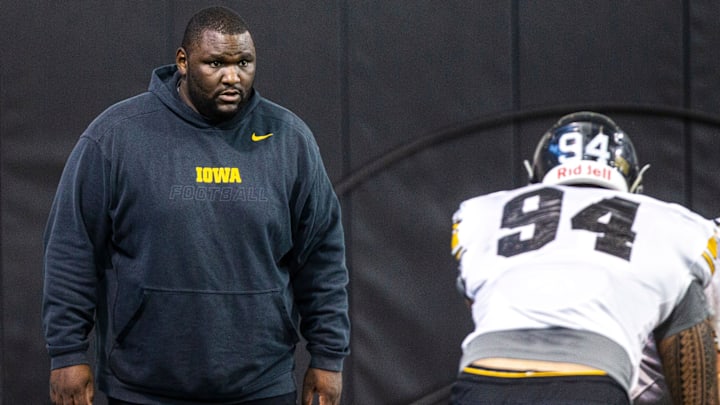 Iowa assistant defensive line coach Kelvin Bell calls out to Iowa defensive end A.J. Epenesa (94) during a NCAA football practice on Monday, Dec. 17, 2018, at the Hansen Football Performance Center in Iowa City.

181217 Fb Practice 006 Jpg