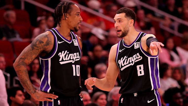 Mar 1, 2025; Houston, Texas, USA; Sacramento Kings forward DeMar DeRozan (10) talks with guard Zach LaVine (8) during a timeout against the Houston Rockets during the third quarter at Toyota Center. Mandatory Credit: Erik Williams-Imagn Images
