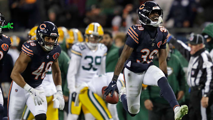 Bears backup slot cornerback Josh Blackwell emerges from the scrum after saving the day with an onside kick recovery against Green Bay.