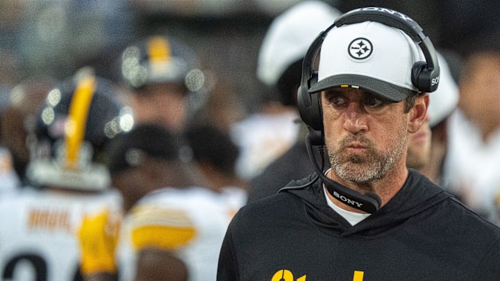 Pittsburgh Steelers quarterback Aaron Rodgers (8) walks along the sideline with a head set during the first half of the first preseason game where the Jacksonville Jaguars hosted the Pittsburgh Steelers Saturday Aug. 9, 2025, at EverBank Stadium in Jacksonville, Fla. [Doug Engle/Florida Times-Union]