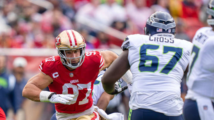 September 18, 2022; Santa Clara, California, USA; San Francisco 49ers defensive end Nick Bosa (97) rushes against Seattle Seahawks offensive tackle Charles Cross (67) during the first quarter at Levi's Stadium. Mandatory Credit: Kyle Terada-Imagn Images