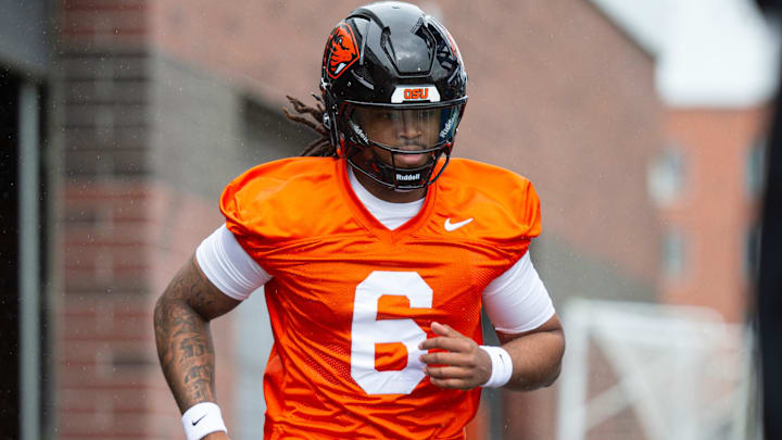Oregon State's Maalik Murphy (6) runs onto the field during the first day of spring practice at the Tommy Prothro Football Complex on Tuesday, March 4, 2025, in Corvallis, Ore.