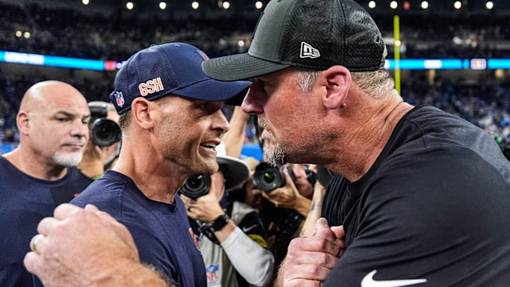 Detroit Lions head coach Dan Campbell, right, shakes hands with Chicago Bears head coach Ben Johnson after 52-21 win over the Bears at Ford Field in Detroit on Sunday, Sept. 14, 2025.