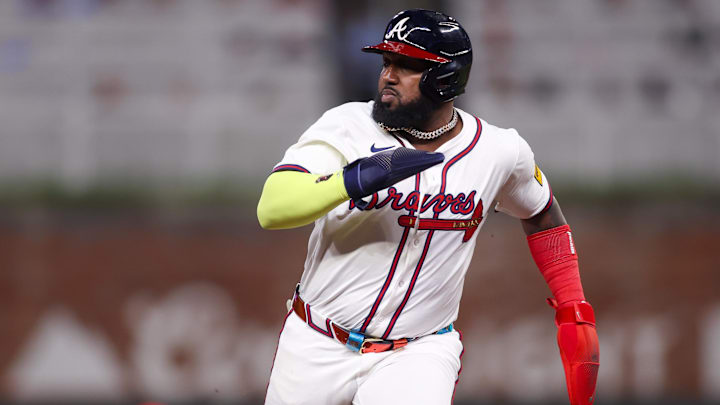 May 7, 2025; Atlanta, Georgia, USA; Atlanta Braves designated hitter Marcell Ozuna (20) runs to third base against the Cincinnati Reds in the sixth inning at Truist Park. Mandatory Credit: Brett Davis-Imagn Images