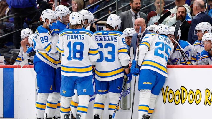 Apr 5, 2026; Denver, Colorado, USA; St. Louis Blues head coach Jim Montgomery talks with defenseman Colton Parayko (55) and left wing Pavel Buchnevich (89) and center Robert Thomas (18) and left wing Jake Neighbours (63) and right wing Jordan Kyrou (25) in the third period against the Colorado Avalanche at Ball Arena. Mandatory Credit: Isaiah J. Downing-Imagn Images