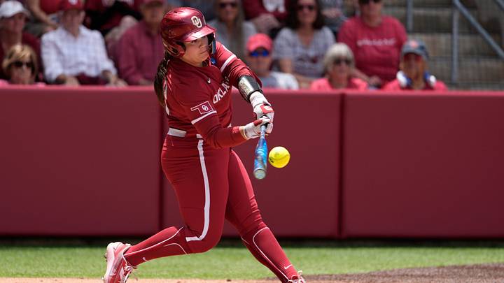 Oklahoma Sooners infielder Lexi McDaniel (12) hits a home run in the third inning of Game 2 of the NCAA softball Norman Super Regional between the University of Oklahoma Sooners and the Mississippi State Bulldogs at Love's Field in Norman, Okla., Saturday, May 23, 2026. Oklahoma Sooners infielder Lexi McDaniel (12) hits a home run in the third inning of Game 2 of the NCAA softball Norman Super Regional between the University of Oklahoma Sooners and the Mississippi State Bulldogs at Love's Field in Norman, Okla., Saturday, May 23, 2026.