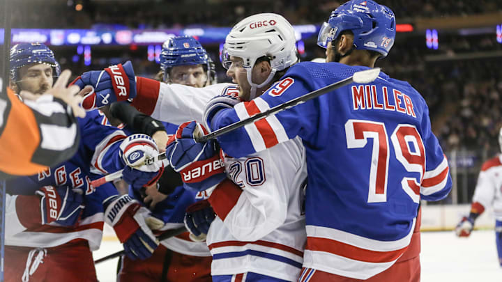 Feb 15, 2024; New York, New York, USA; New York Rangers defenseman K'Andre Miller (79) grabs