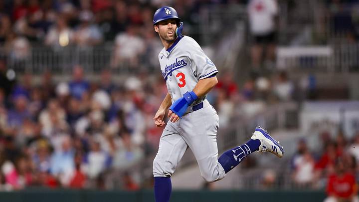 May 2, 2025; Atlanta, Georgia, USA; Los Angeles Dodgers left fielder Chris Taylor (3) takes second on a wild pitch against the Atlanta Braves in the eighth inning at Truist Park. Mandatory Credit: Brett Davis-Imagn Images