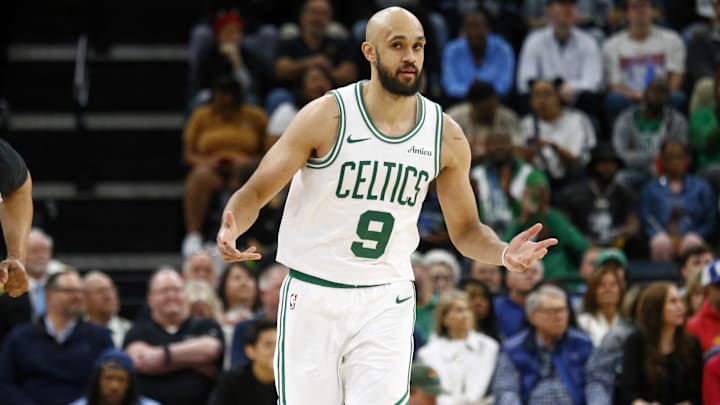 Mar 31, 2025; Memphis, Tennessee, USA; Boston Celtics guard Derrick White (9) reacts after a three point basket during the fourth quarter  against the Memphis Grizzlies at FedExForum. Mandatory Credit: Petre Thomas-Imagn Images