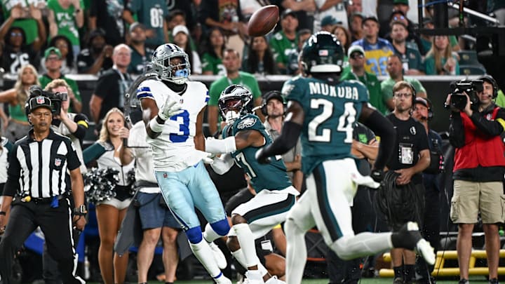 Sep 4, 2025; Philadelphia, Pennsylvania, USA; Dallas Cowboys wide receiver George Pickens (3) makes a reception defended by Philadelphia Eagles cornerback Quinyon Mitchell (27) during the first quarter of the game at Lincoln Financial Field. Mandatory Credit: Eric Hartline-Imagn Images